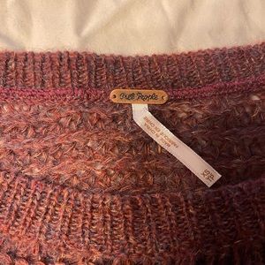 Used Free People sleeveless sweater.